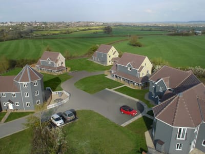 Aerial view of Wiltshire Leisure Village with green lawns