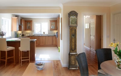 Bright and spacious kitchen area with wooden cabinets