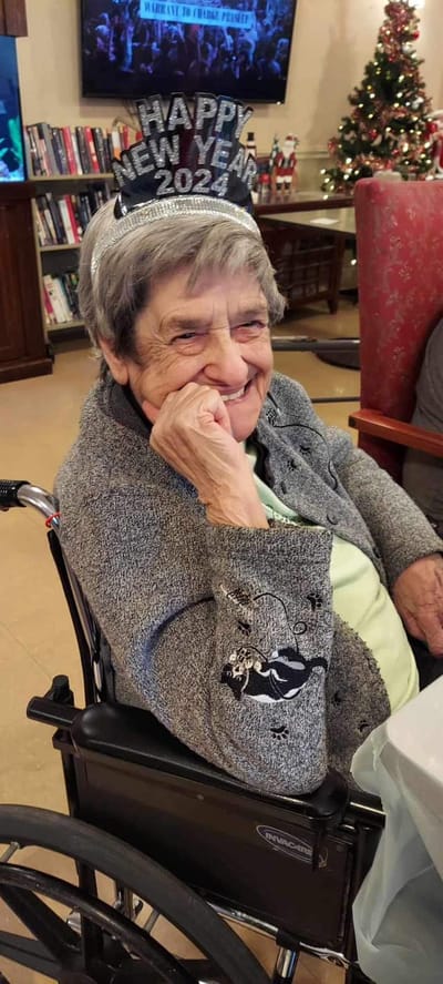 Resident celebrating New Year's in a common area