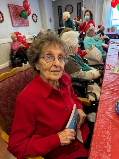 Residents enjoying a holiday activity in a common area