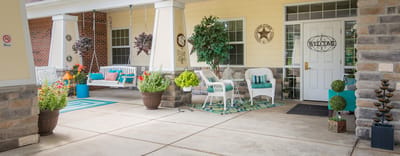 Welcoming outdoor seating area at the facility entrance