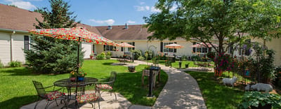 Garden area with colorful umbrellas and seating