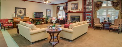 Bright common area with comfortable seating and decor