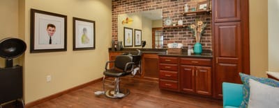 Interior view of a salon with styling chair and decor