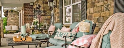 Cozy outdoor seating area with decorative pillows