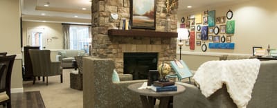 Comfortable common area with seating and artwork