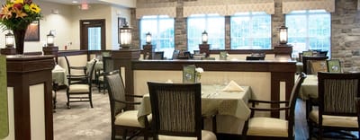 Elegant dining area with tables set for meals