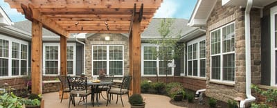 Outdoor patio area with tables and chairs