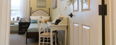 Cozy private room with bed and desk