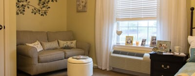 Cozy resident room with a couch and decor