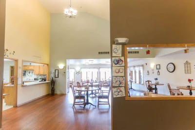 Interior view of a dining area with tables and chairs