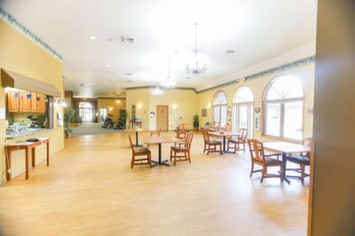 Bright dining area with tables and chairs