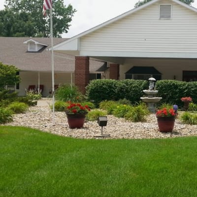 Exterior view of the facility with landscaping