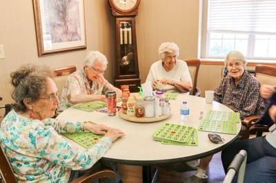 Residents enjoying a game of bingo together.
