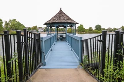 Pathway leading to a gazebo at the waterside