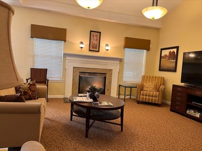 Cozy common area with seating and fireplace