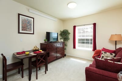 Cozy living area with furniture and decor.