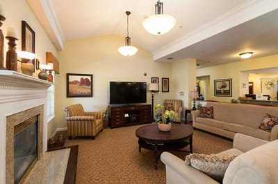 Comfortable lounge area with furniture and a television.