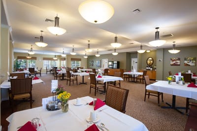 Well-decorated dining area with tables and chairs