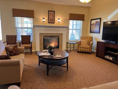 Cozy common area with seating and fireplace