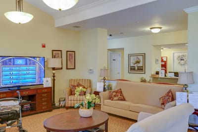 Cozy common area with seating and television