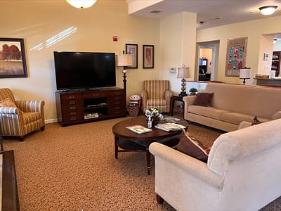 Common area with seating and a television.