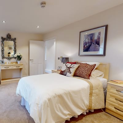 Cozy bedroom with a bed and decorative elements