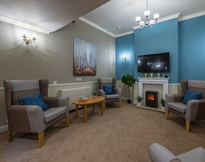 Cozy common area with comfortable seating and decor.