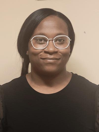 Portrait of a staff member with glasses