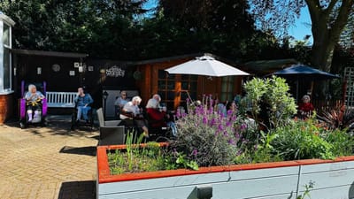 Residents enjoying the outdoor garden area