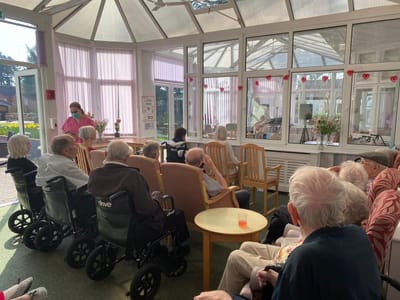Residents engaged in an indoor activity.