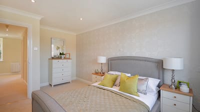 Cozy bedroom with soft decor and lighting