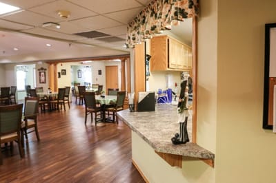 Interior view of the dining area with tables and decor.