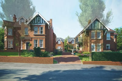 Exterior view of a residential building in a garden setting.
