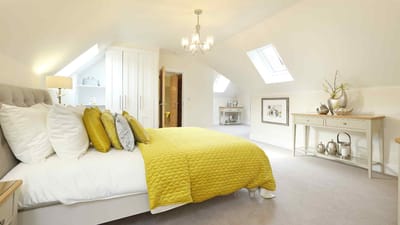 Brightly decorated bedroom with yellow accents