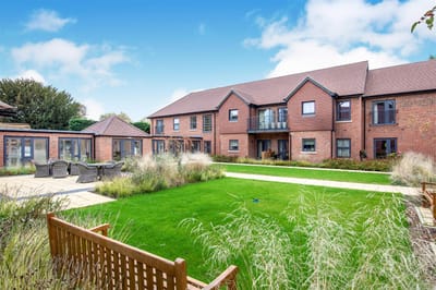 Outdoor area with landscaped garden and seating