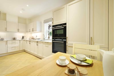 Modern kitchen with table settings