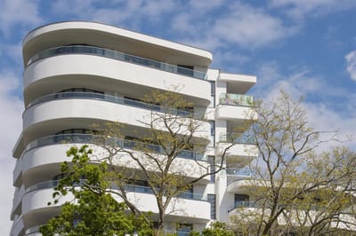 Exterior view of a modern building with balconies.