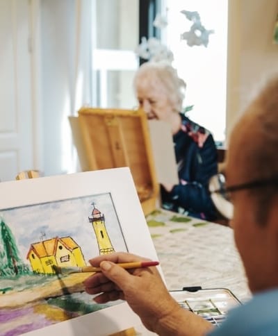 Residents engaged in an art activity.