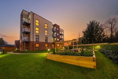 Modern assisted living building at sunset