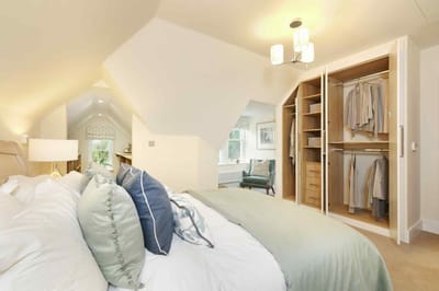 Bright, welcoming bedroom with storage