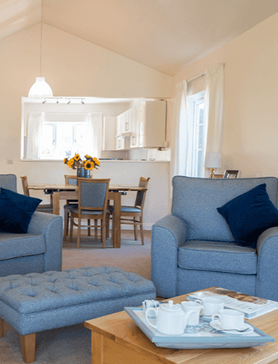 Cozy common area with seating and dining table.
