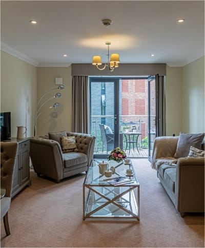 Cozy common area with seating and balcony view