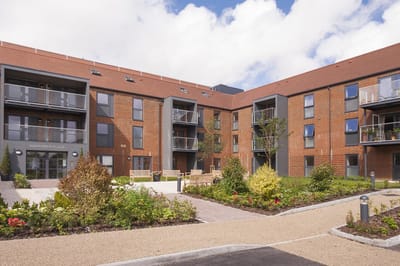 Building exterior with landscaped garden area