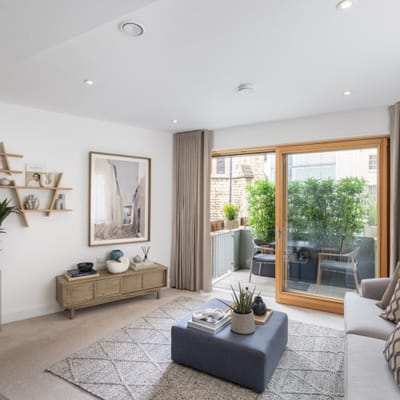 Cozy interior lounge area with a balcony