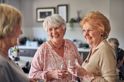 Residents socializing and enjoying drinks together