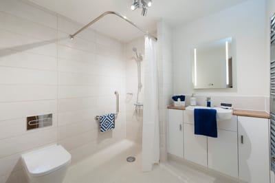 Modern bathroom with shower and amenities