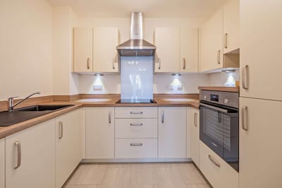 Modern kitchen interior with cabinets and appliances