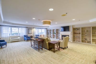 Common area with seating and a fireplace