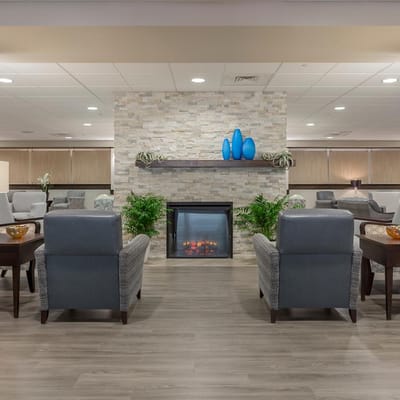 Interior lounge area with seating and a fireplace